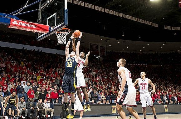 Derrick Walton Jr. (10) and Ricky Doyle (32)