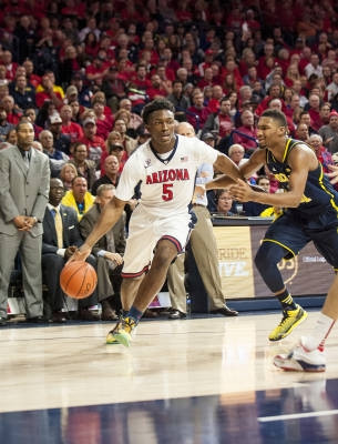 Zak Irvin (21) and LaVall Jordan