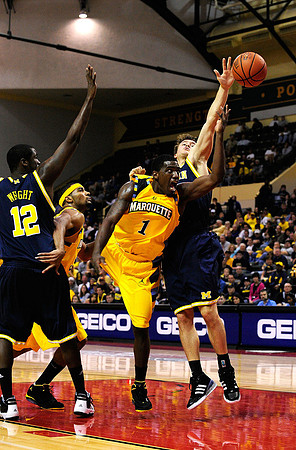Anthony Wright (12) and Zack Novak (0)
