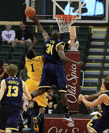 Matt Vogrich (13) and DeShawn Sims (34)