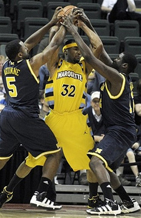 Eso Akunne (5) and Anthony Wright (12)