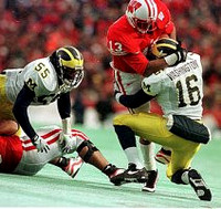 Brent Washington (16) and Dhani Jones (55