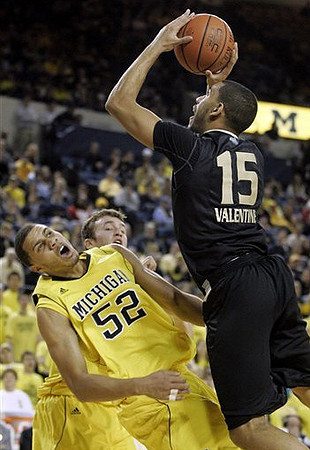 Jordan Morgan (52) and Zack Novak (0)