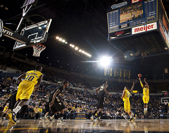 Tim Hardaway Jr. (10), Jordan Morgan (52), and Darius Morris (4)