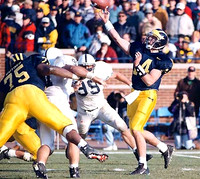 Brian Griese (14) and Thomas Guynes (75)