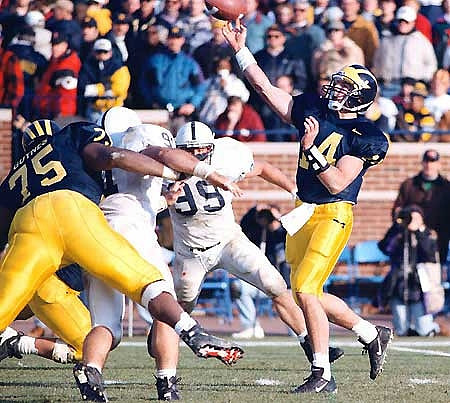 Brian Griese (14) and Thomas Guynes (75)