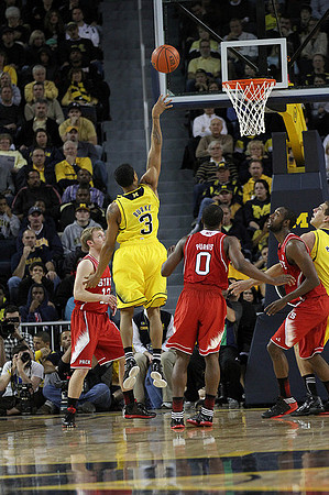 Trey Burke (3) and Mitch McGary (4)