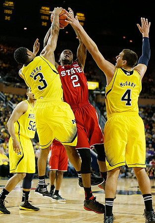Jordan Morgan (52), Trey Burke (3), and Mitch McGary (4)