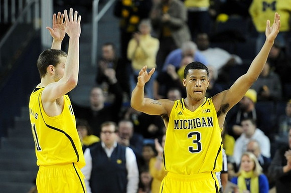 Nik Stauskas (11) and Trey Burke (3)