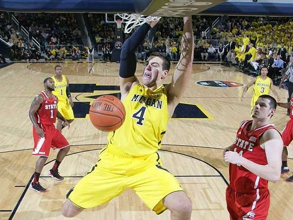 Glenn Robinson III (1), Mitch McGary (4), and Trey Burke (3)