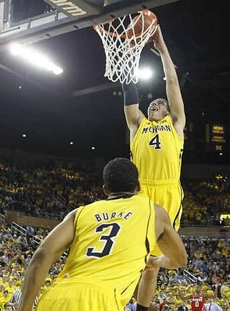 Trey Burke (3) and Mitch McGary (4)