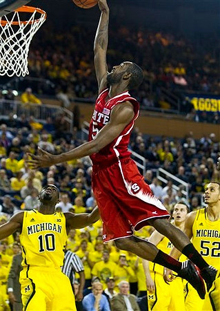Tim Hardaway Jr. (10), Nik Stauskas (11), and Jordan Morgan (52)