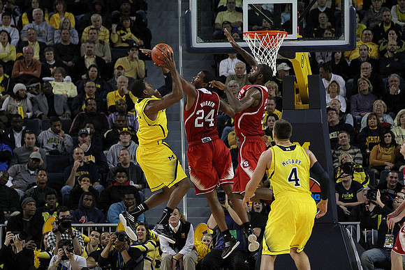 Glenn Robinson III (1) and Mitch McGary (4)