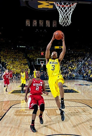 Trey Burke (3) and Tim Hardaway Jr. (10)
