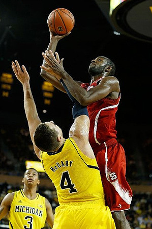 Trey Burke (3) and Mitch McGary (4)