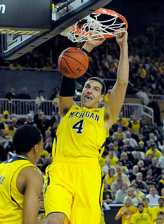 Mitch McGary (4) and Trey Burke (3)
