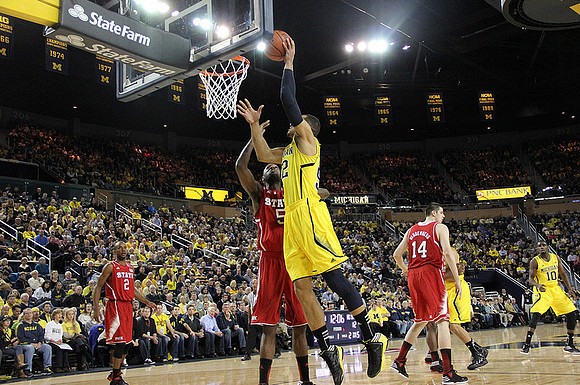 Jordan Morgan (52) and Tim Hardaway Jr. (10)