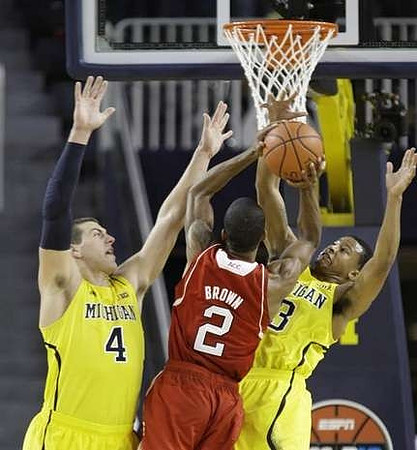 Mitch McGary (4) and Trey Burke (3)