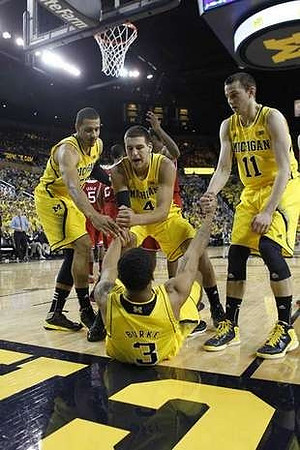 Jordan Morgan (52), Trey Burke (3), Mitch McGary (4), and Nik Stauskas (11)