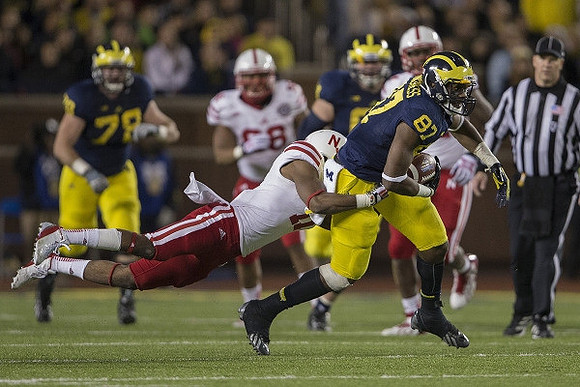 Erik Magnuson (78) and Devin Funchess (87)