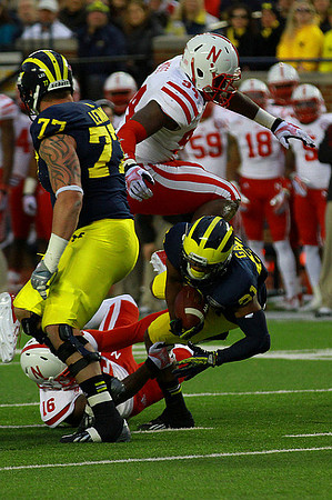 Taylor Lewan (77) and Jeremy Gallon (21)