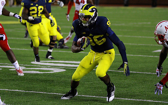 Fitzgerald Toussaint (28) and Jehu Chesson (86)