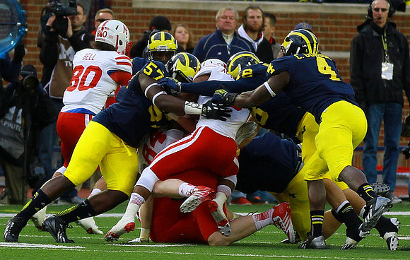 Frank Clark (57), Blake Countess (18), and Cameron Gordon (4)