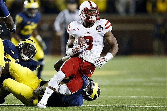 Quinton Washington (76) and James Ross (15)