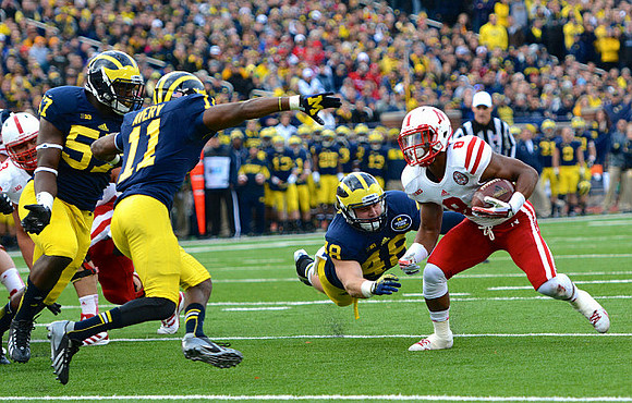 Frank Clark (57), Courtney Avery (11), and Desmond Morgan (48)