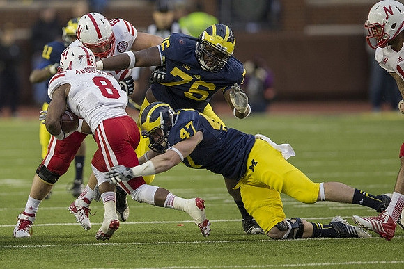 Courtney Avery (11), Jake Ryan (47), and Quinton Washington (76)
