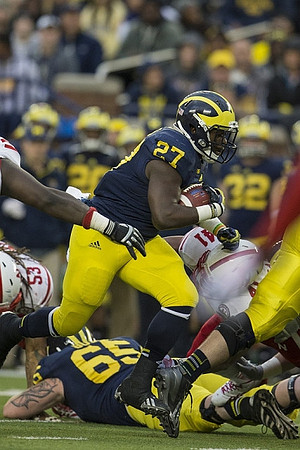 Derrick Green (27) and Kyle Bosch (65)