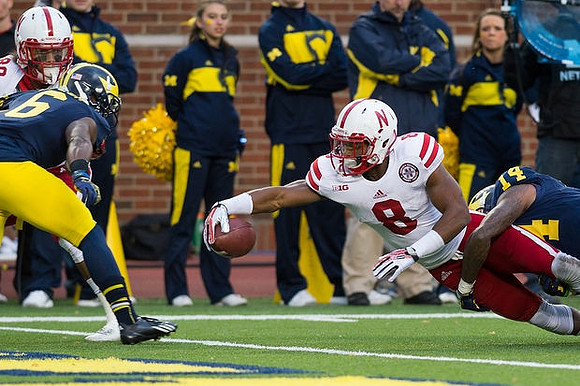 Raymon Taylor (6) and Josh Furman (14)