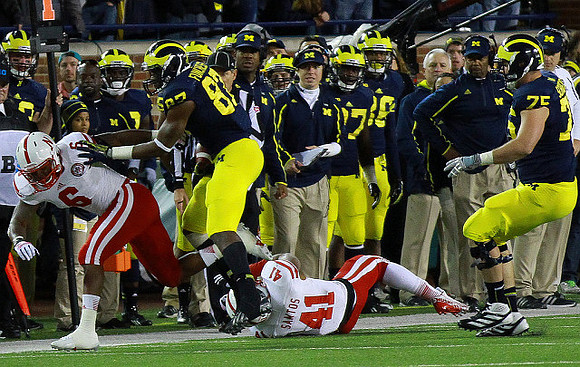 Devin Funchess (87) and Michael Schofield (75)