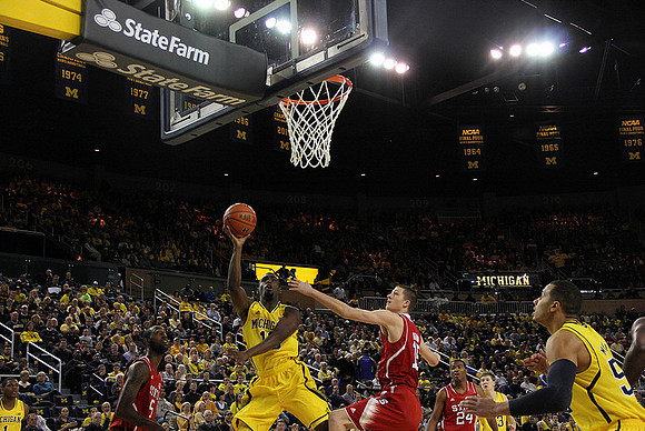 Glenn Robinson III (1), Tim Hardaway Jr. (10), Jordan Morgan (52), and Matt Vogrich (13)