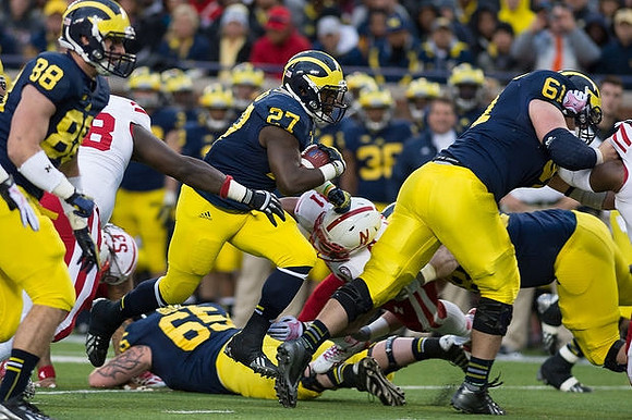 Devin Gardner (98), Kyle Bosch (65), Derrick Green (27), and Graham Glasgow (61)