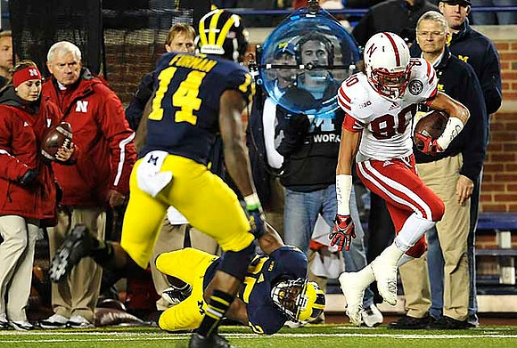 Josh Furman (14) and Dymonte Thomas (25)