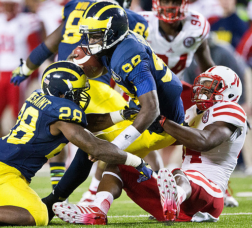 Fitzgerald Toussaint (28), Devin Gardner (98), and A.J. Williams (84)