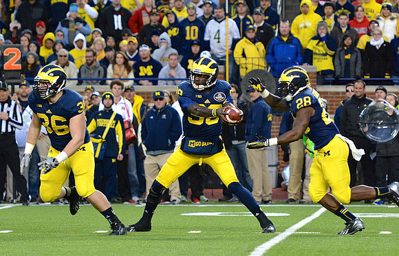 Joe Kerridge (36), Devin Gardner (98), and Fitzgerald Toussaint (28)