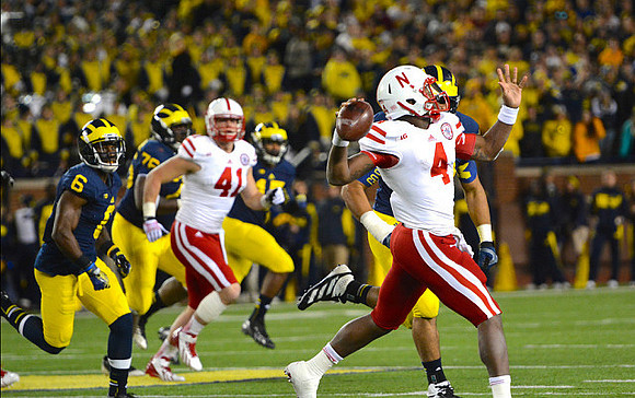 Raymon Taylor (6) and Quinton Washington (76)