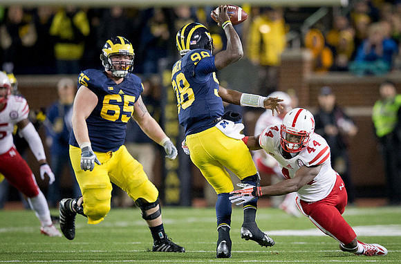 Kyle Bosch (65) and Devin Gardner (98)