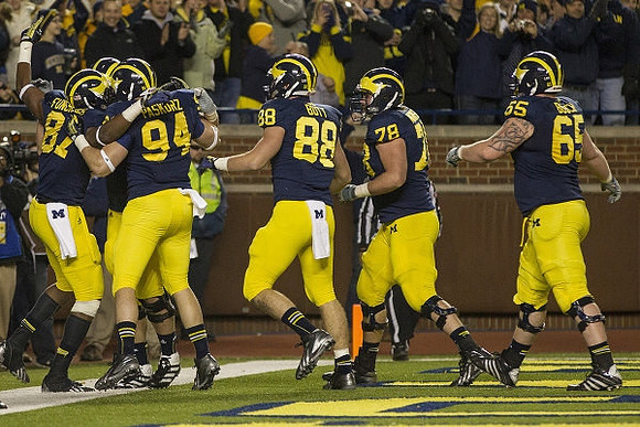 Devin Funchess (87), Jordan Paskorz (94), Jake Butt (88), Erik Magnuson (78), and Kyle Bosch (65)