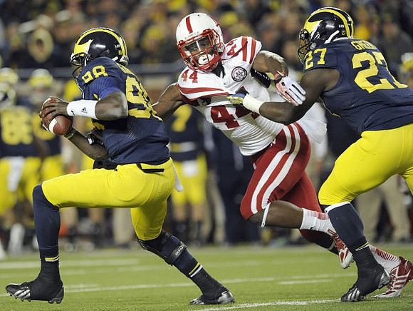 Devin Gardner (98) and Derrick Green (27)