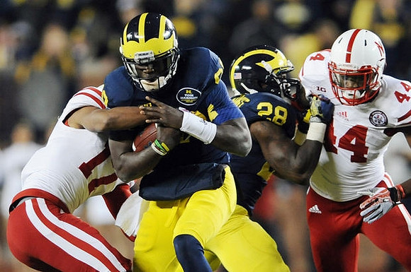 Devin Gardner (98) and Fitzgerald Toussaint (28)