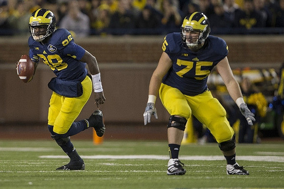 Devin Gardner (98) and Michael Schofield (75)
