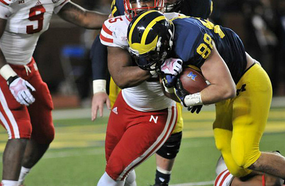 Graham Glasgow (61) and Jake Butt (88)