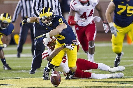 Drew Dileo (9) and Michael Schofield (75)