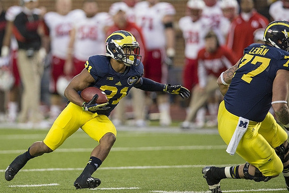 Jeremy Gallon (21) and Taylor Lewan (77)