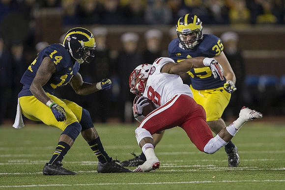 Josh Furman (14) and Joe Bolden (35)