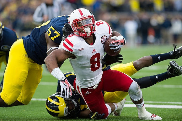 Frank Clark (57) and Courtney Avery (11)