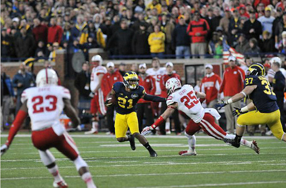 Jeremy Gallon (21) and Bobby Henderson (37)